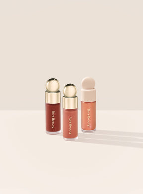 Rare Beauty Mini Blush & Luminize Trio.                    Best selling Soft Pinch Liquid Blush and Positive Light Liquid Luminizer in new and fan-favorite shades.