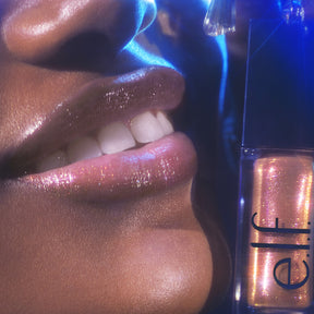 Glow Reviver Lip Oil Glimmer.         Ultra-glossy glimmer lip oil.