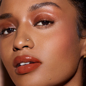 Fenty Beauty by Rihanna 
Gloss Bomb Cream Color Drip Lip Cream.